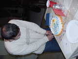 Click to see Ken cutting cake 2.jpg