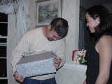 Click to see Ken opening gift.jpg